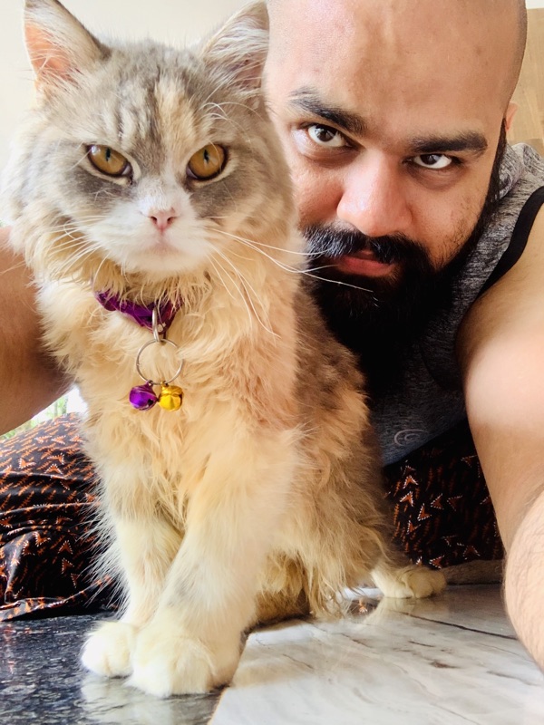 Shamsheer AT with his cat Ruby